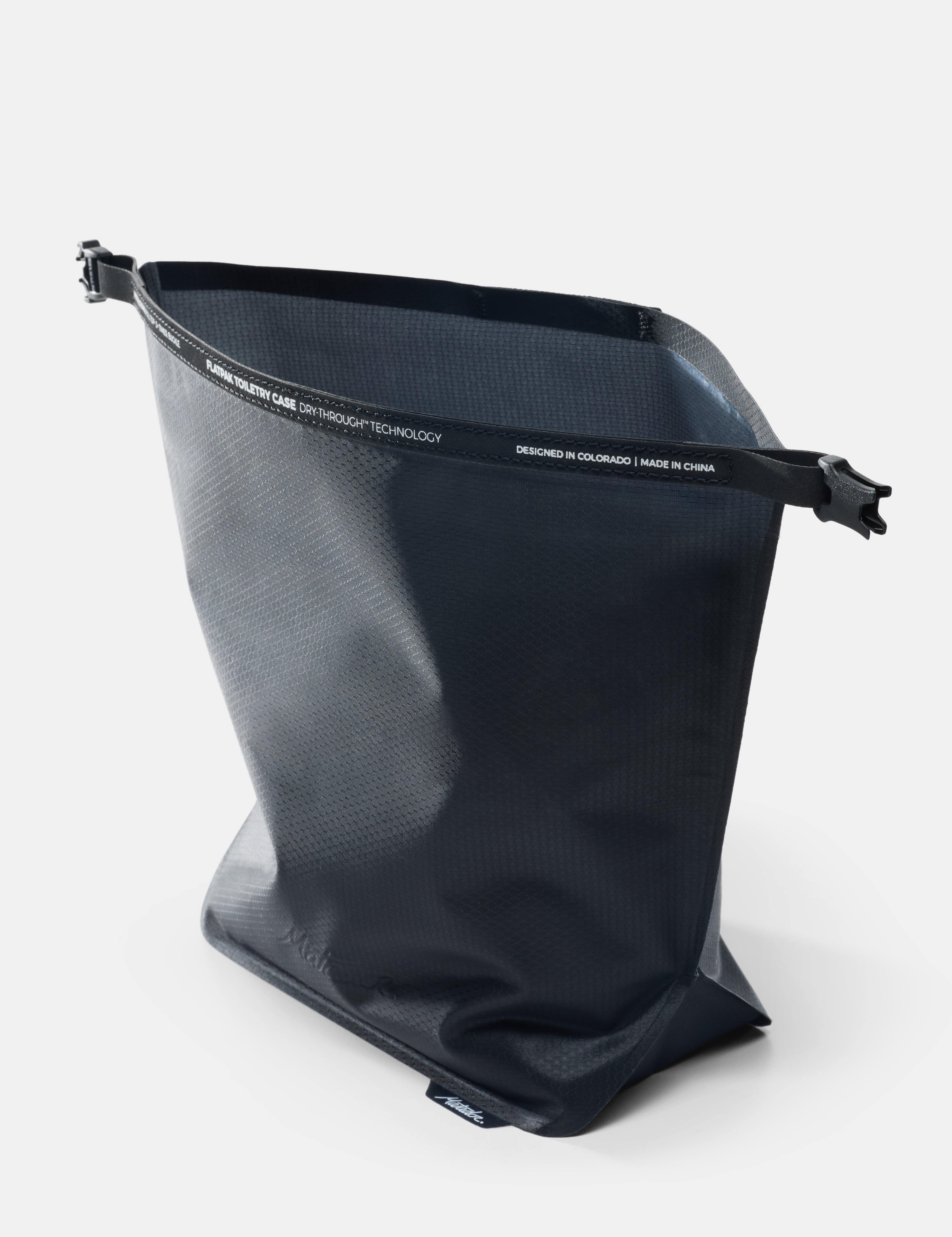 Black toiletry case on a white background