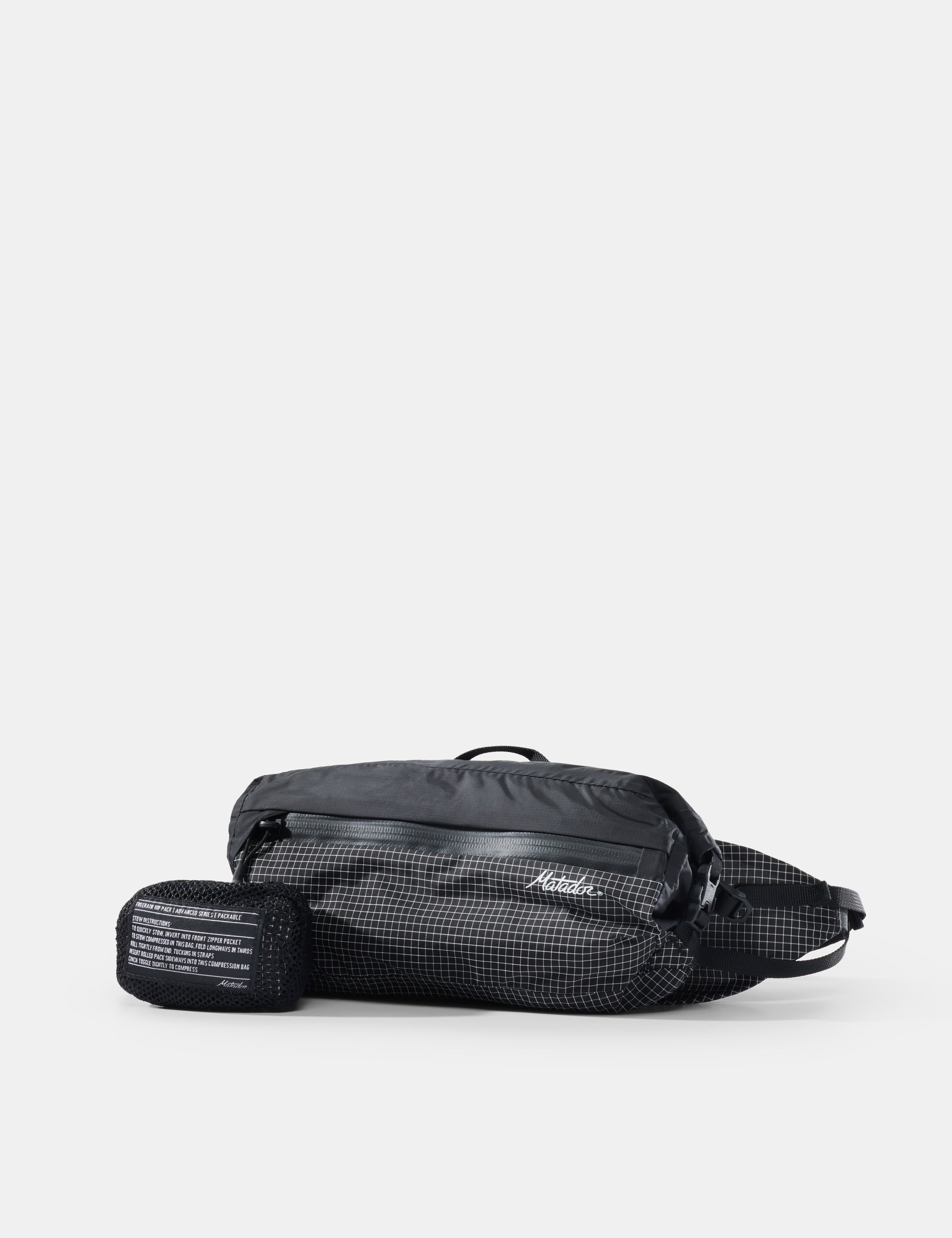 Black waist bag with visible brand logo on a white background