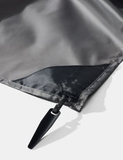 Close-up of pocket blanket corner stake on a white background