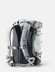Gray backpack with multiple straps on a white background