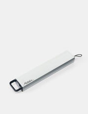 Metal pill canister on a white background